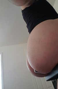 Side butt with man thong and large plug in