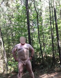 Playing around naked in the woods.