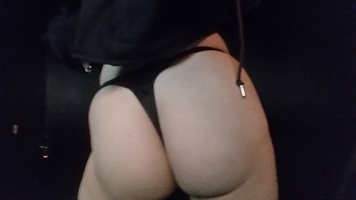 A pic of my ass while in the theater in the light of the screen