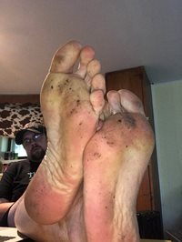 Lick my feet clean, slave.