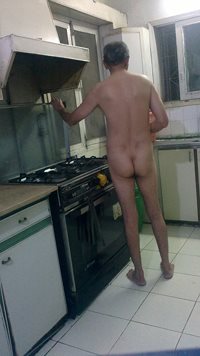 Me nude in kitchen