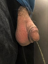 Guy at work always follows me into men's room - wants to take pics. What ca...