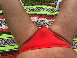 Sunbathing in Bayonne Park in my red Bikini