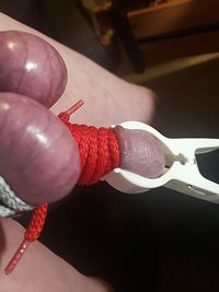 Learning to tie, and use clamp on my cock head CBT training.  Master Silver...