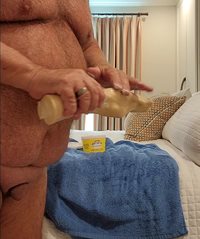 Condom and lots of Boy Butter will let it slide right in my ass to its inne...