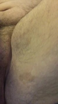 Hairy, soft and saggy.