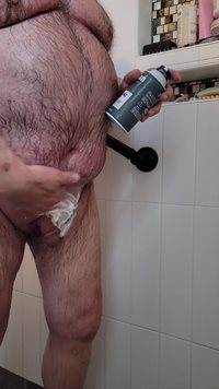 Shaving my cock, balls and ass in the shower.