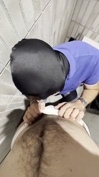 Sucking cock on a public toilet