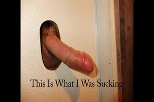 Longer vid of sucking the huge cock at gloryhole.