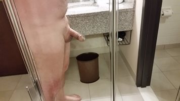 Messing around in front of mirror in hotel