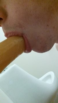 Sucking on my third dildo while I ram the other up my ass