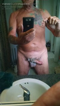 Soaped up swinging cock